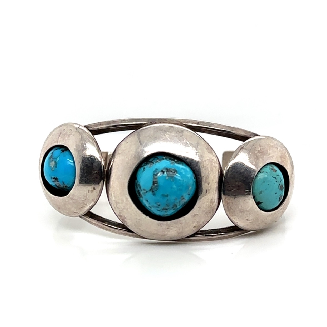 Sterling Silver and Turquoise Native American Cuff

Fits 7 Inch Wrist
1 Inch at Widest