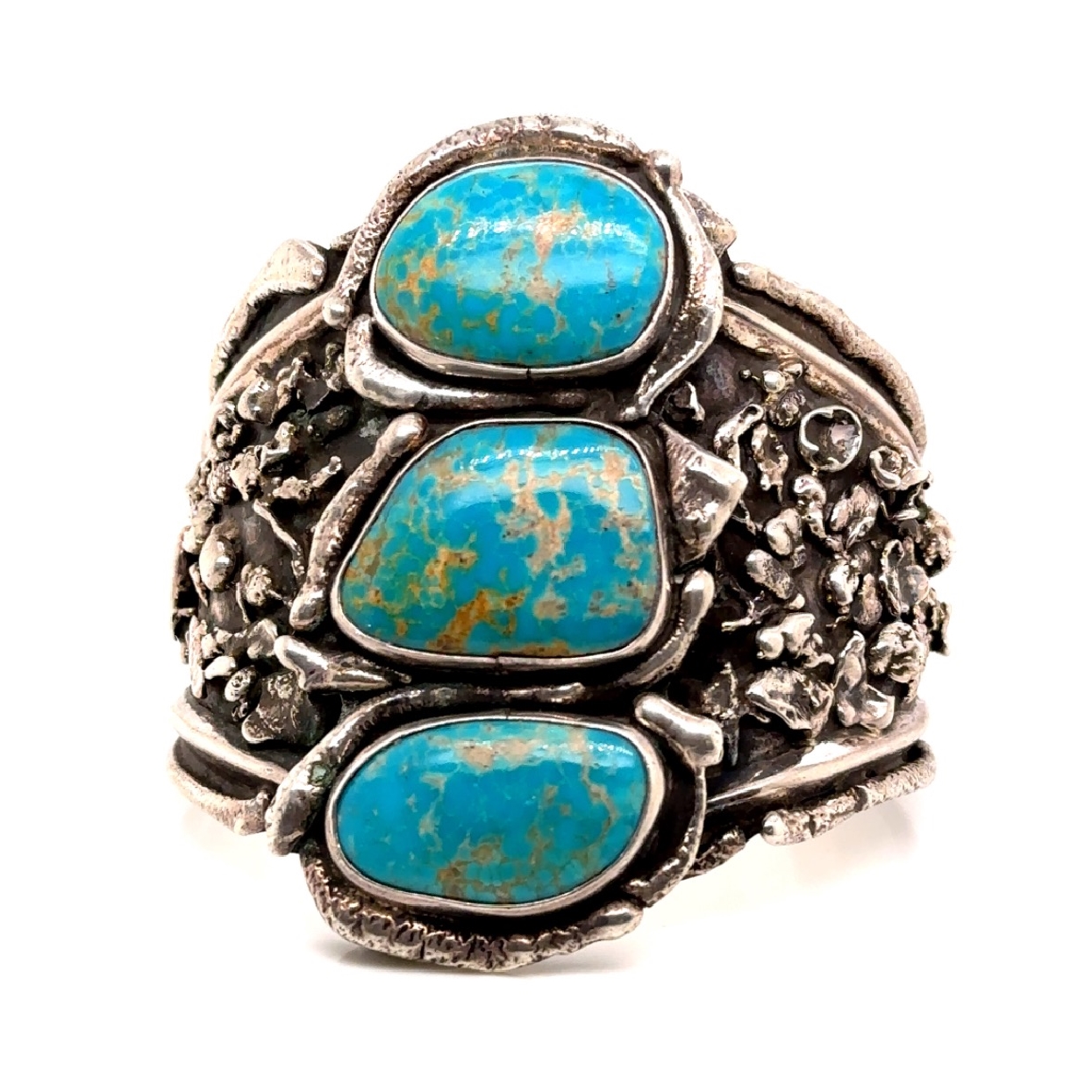Native American Sterling Silver and Turquoise Chunky Cuff

Fits 8-9 Inch Wrist 
3 Inches at Widest