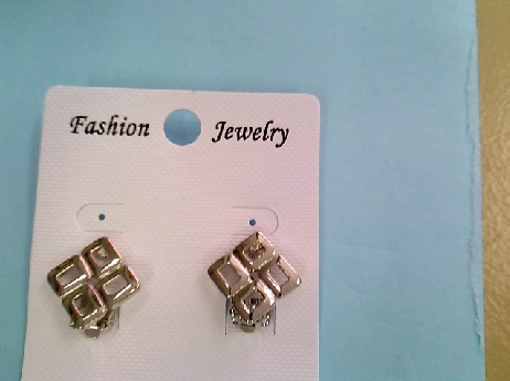 1216: One pair of silver tone costume clip earrings of four open squares