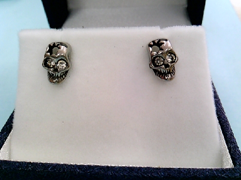 1365: half pair of Chisel Brand stainless steel Skull stud earring with white crystals in eyes