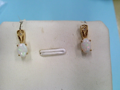 1574: One pair of 10k yellow gold genuine 6x4 mm Opal and 2/0.01ctrw RBC diamond stud earrings