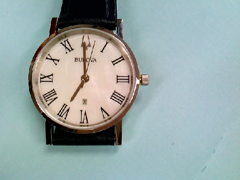 1796: One Bulova ladies blue leather strap white Mother of Pearl dial  roman numbers calendar