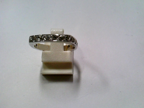 1931: One 14k white gold custom made 15 RBC diamond band 