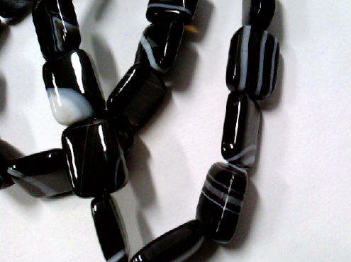 2003: One black and white genuine  Agate stone stretch bracelet