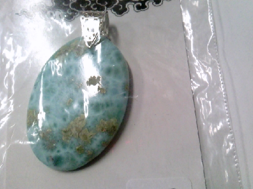 2021: Oval larimar (rare blue peetolite) pendant