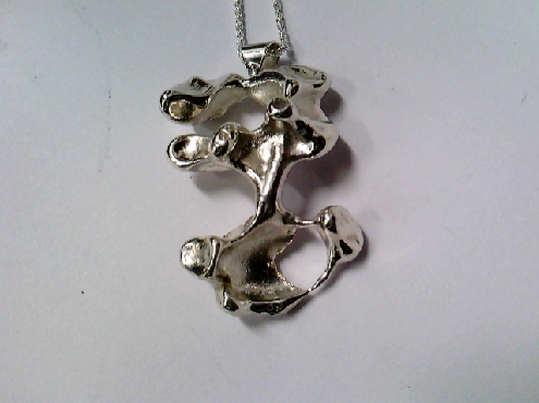 2503: One sterling silver 20 inch Spiga style chain with a custom made Organic Casted Pendant