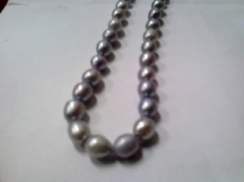 2610: One stand of grey colored Potatoe shaped Freshwater cultured pearl strand knotted