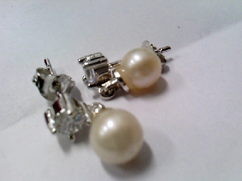 2635: One pair of sterling silver double gallery set white round cubic zirconia stone with a 4mm round white Freshwater pearl dangle style earring