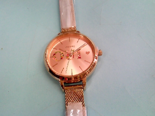 2637: One ladies rose gold tone OIU & ME foral dial with mess style band watch 