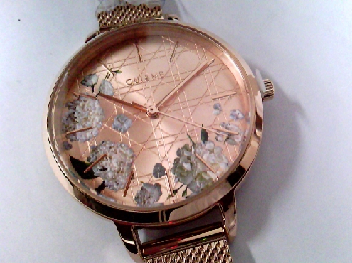 2646: One ladies OUI & ME watch of rose gold plate case and mess band with a textured dial and white floral motif