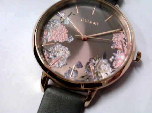 2647: One ladies OUI & ME watch of rose gold plated case grey leather strap and floral motif dial 