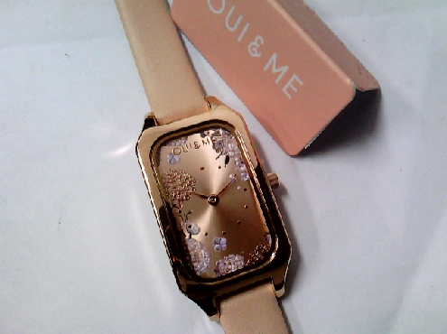 2652: One ladies OIU & Me watch of Rose gold plated rectangular case with a floral dial  pech leather strap 