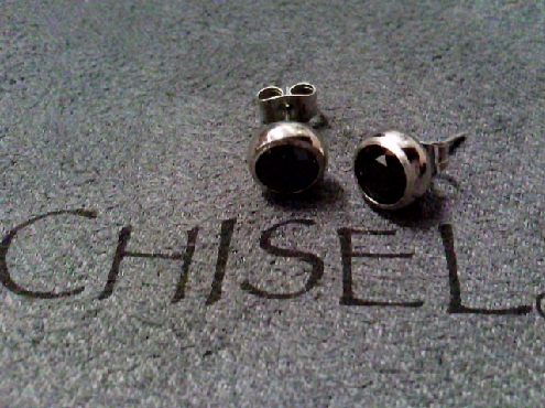 2802: One pair of Chisel brand stainless steel round 6.00mm black cubic zirconia bezel set stud earrings