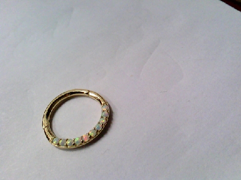 2841: One 14k yellow gold Lined set opal hinged nose hoop