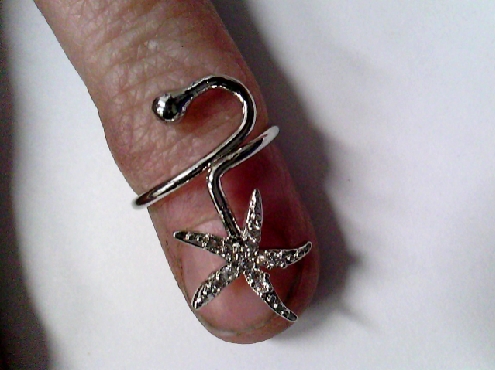 2867: One laides Star fish motif multi paved gems adjustable rhodium plated brass nail rings