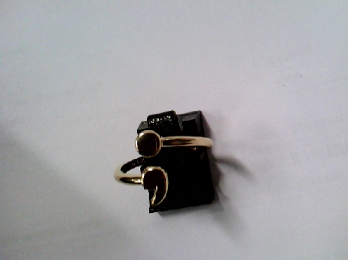 2918: One ladies 10k yellow gold custom made Comma symbol ring 