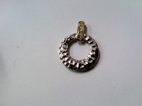 3187: One sterling silver 925  hammered textured circle pendant with a yellow gold plated bail set with white cubic Zirconia stones