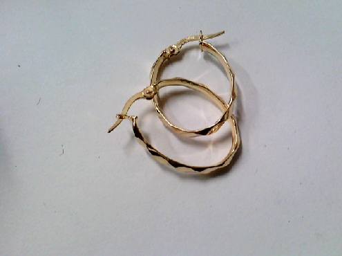 3192: One pair of 10k yellow gold oval twisted looking hoop earrings