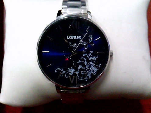 3203: One ladies stainless steel Lorus Blue butterfly dial watch