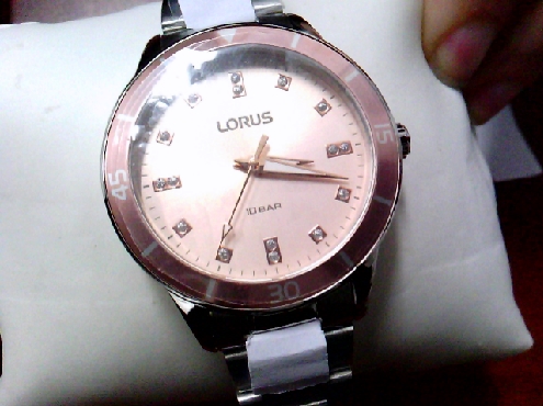 3207: One ladies LORUS stainless steel rose gold metal strap watch