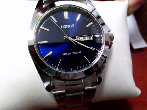 3208: One gentleman s LORUS stainless steel blue dial water resist watch