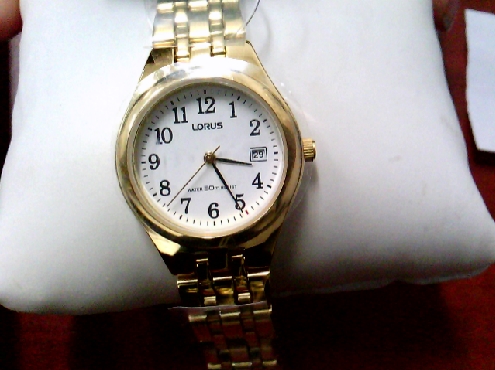 3209: one ladies LORUS gold tone watch