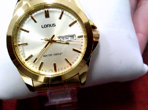 3303: One gentleman s LORUS gold tone japan movment watch