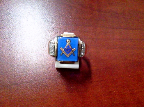 3405: One custom made 10ky gold blue Masonic emblem ring set with six princess cut diamonds VS-SI H-I Colour