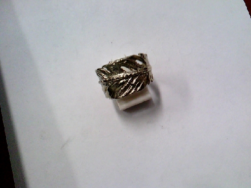 3445: One ladies 10k white gold wrapped feather ring