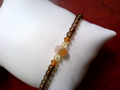 3529: One ladies bronze glass beaded bracelet with yellow cyrstals and citrine  with yellow gold filled loabster clasp