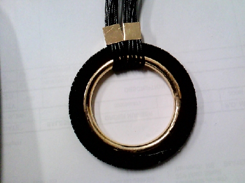 3619: One ladies costumer fashion jewellery black and gold long necklace