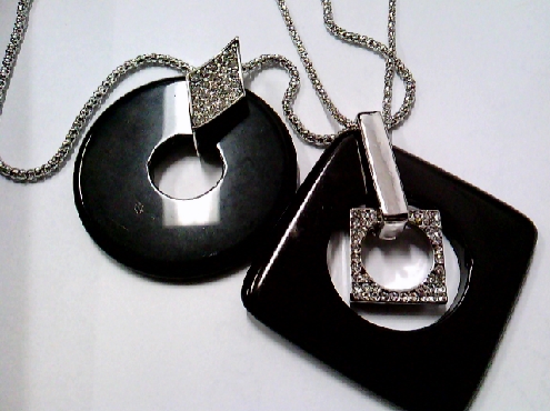 3755: One silver tone Model France 30 inch popcorn chain with a black circle donut or a square  wiith a white rhinestone crystal diamond shaped pendant bail 