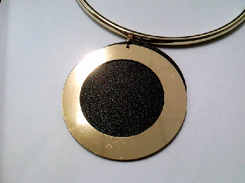 3756: One Model France gold tone circle black and gold tone open circle pendant necklace