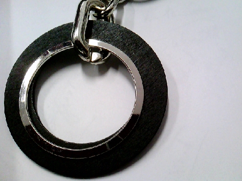 3760: One Model France multi black cord with double black and silver tone circle pendant