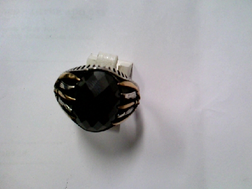 3800: One gent s 925 sterling silver two-tone claw ring set with black checkerboard cut stone