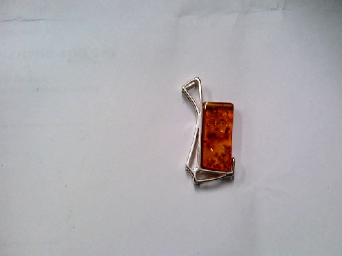 3810: One ladies 925 sterling silver pendant set with rectangular amber 