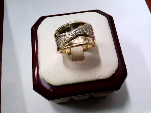 3857: One ladies custom made 10k yellow gold wide cigar band syle band  pave set with 29 diamonds  0.17crtw 