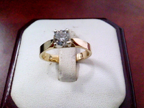 3877: One 14k yellow and white gold Diamond Solitare Engagment ring set with on RBC 0.42crtw I1 LM