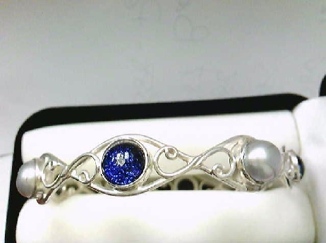 388: One sterling silver bangle with 4 grey freshwater pearls and 5 round blue diamond Inclusion tm dichoric glass stones 