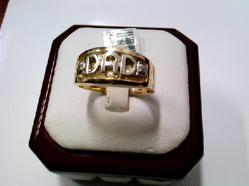 3881: One 10k yellow and white rasied and lower relief DAD band style ring with two round cubic zirconia s on shoulder