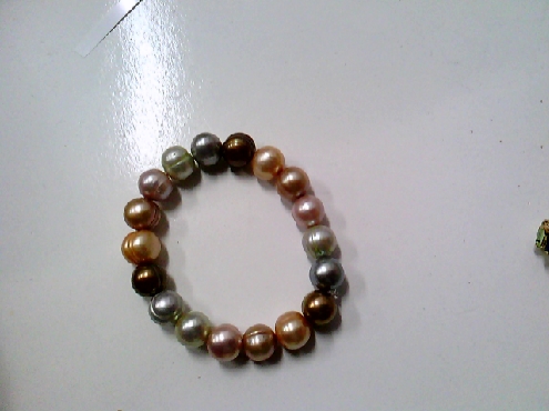 3909: One ladies Freswater Pearls of assorted colors 7 mm Potatoe shaped bracelet 