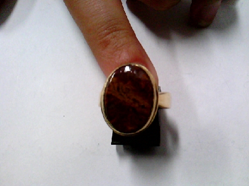 3944: One custom made 10ky gold ring set with genuine Nova Sotian oval agate