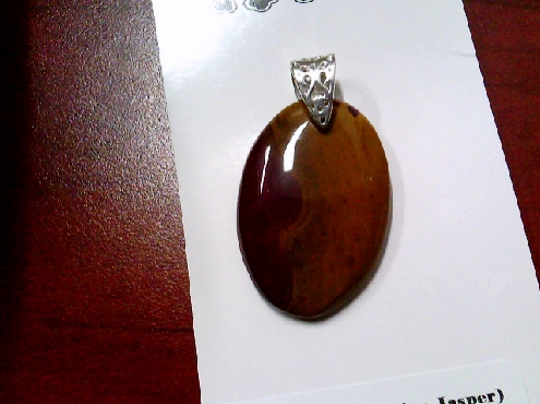 3968: One oval shapped Mookaite pendant on sterling silver red/orangey brown colour