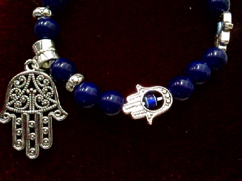 4194: One stretch Evil Eye Fatima hand darl blue glass bead bracelet  