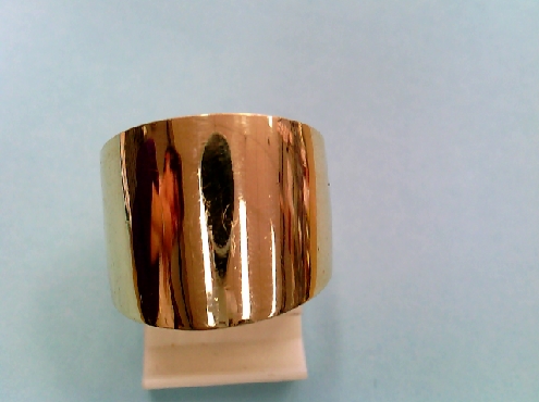 53212: one ladies 14k yellow gold tapered cigar band ring