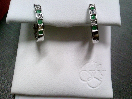 830: Forever Jewellery 10k white gold channel set genuine emerald and diamond hoop earrings. 0.03TW