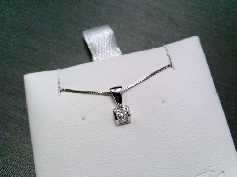 875: Forever Jewellery 10k white gold  tension set full cut diamond pendant on a box chain