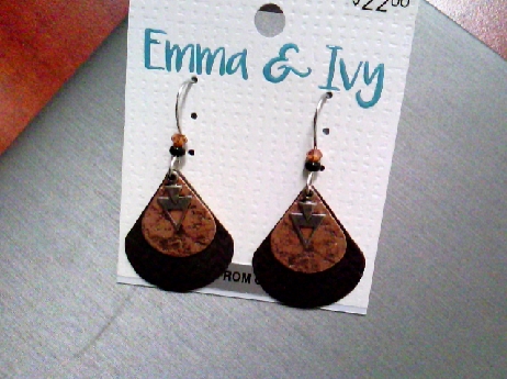 928: Emma & Ivy Copper tear drop shaped disc with a black and brown color laser engraved chevron pattern. With arrow head charms