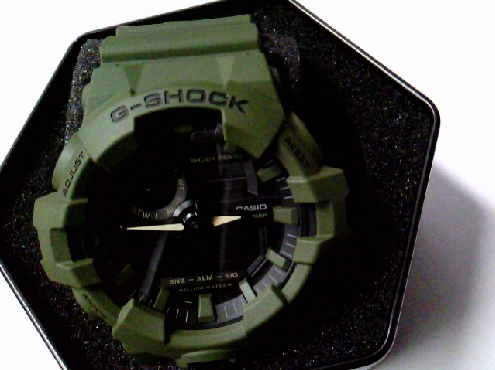 CASIO28: Casio G Shcok Brand gents miltary green strap black dial