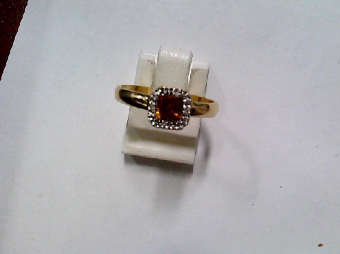 DJSTUD03: One 10k yellow gold genuine square cut citrine 0.50crtw and round diamonds 0.01crtw stacking ring 110.98